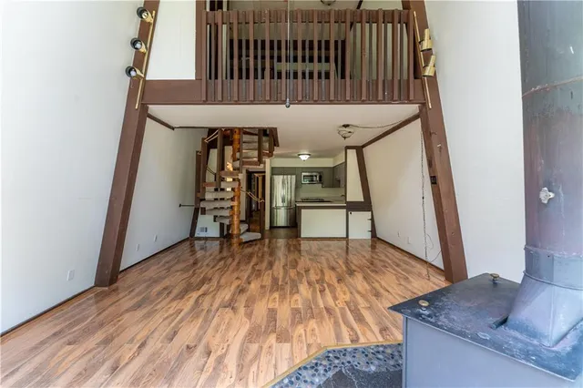 a view of livingroom with furniture and staircase
