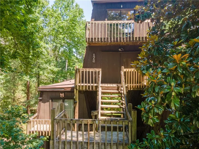 a view of a house with a deck