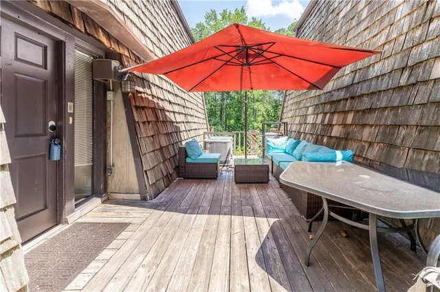 a view of a house with a window and wooden floor