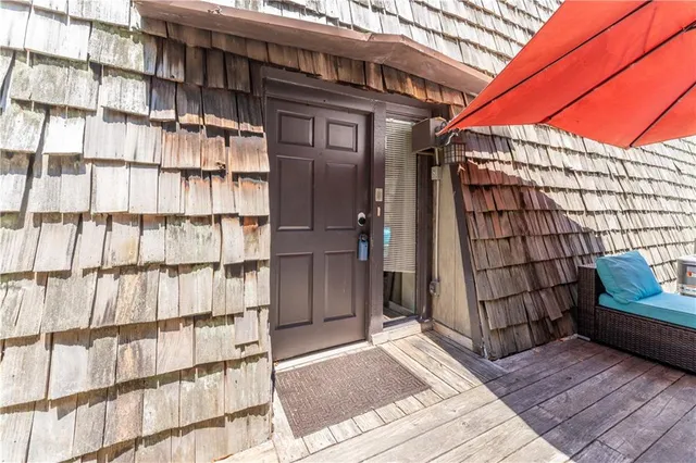 a view of a room with wooden floor and iron walls