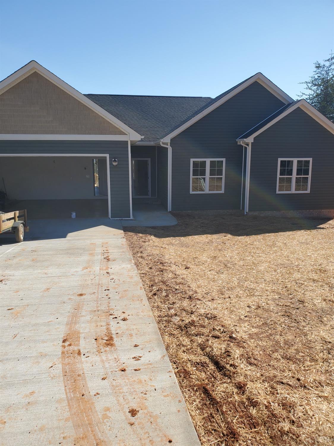 3059 Bells Mill Road Goode, VA 24556 - Photo 1 of 4 a backyard of a house