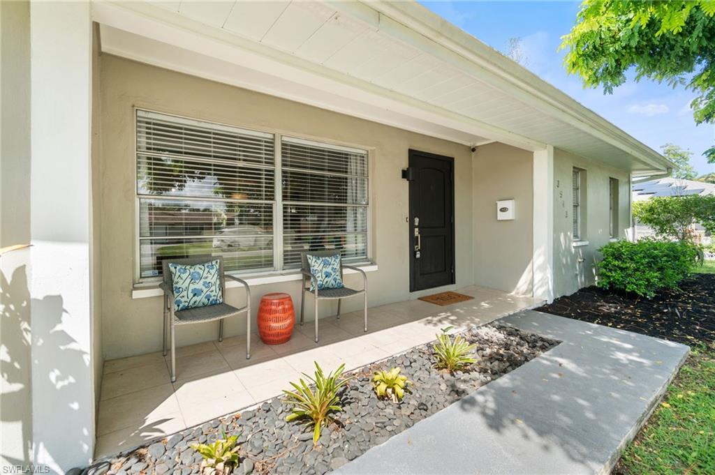 3543 Corana Way Naples, FL 34105 - Photo 26 of 26 a front view of a house