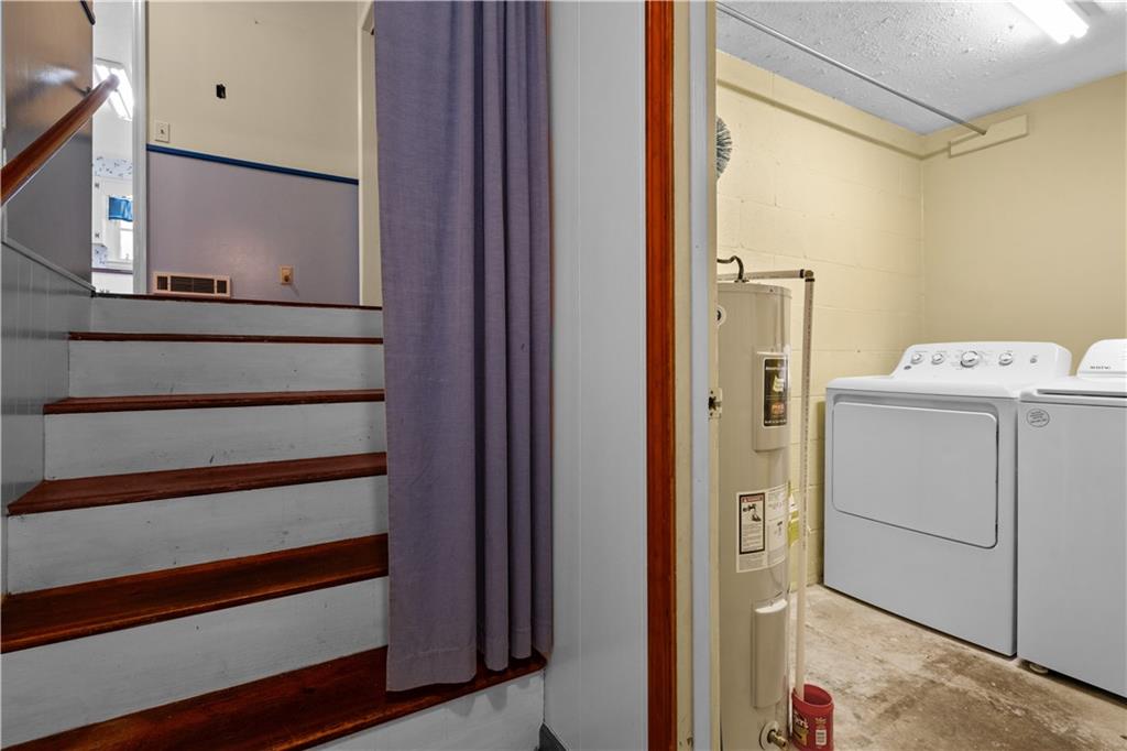 768 Burwell Road Carrollton, GA 30117 - Photo 23 of 42 a utility room with dryer and washer