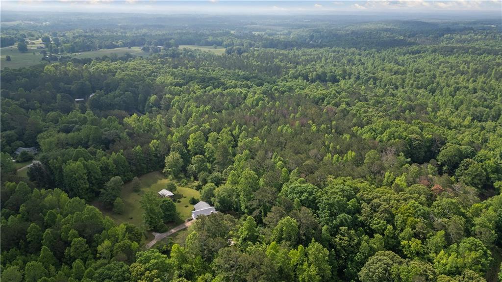 768 Burwell Road Carrollton, GA 30117 - Photo 32 of 42 an aerial view of residential house with outdoor space