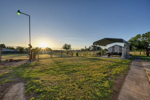 a houses view of a house with a yard