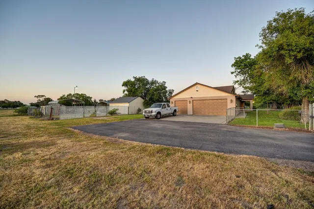 a view of a lake with couches and city view