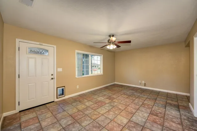 a view of an empty room with window