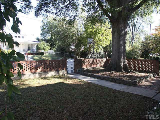 502 Harding Street Raleigh, NC 27604 - Photo 21 of 25 Spralling oak trees and brick fencing adorn this peacefully street inside the beltine community. Yard