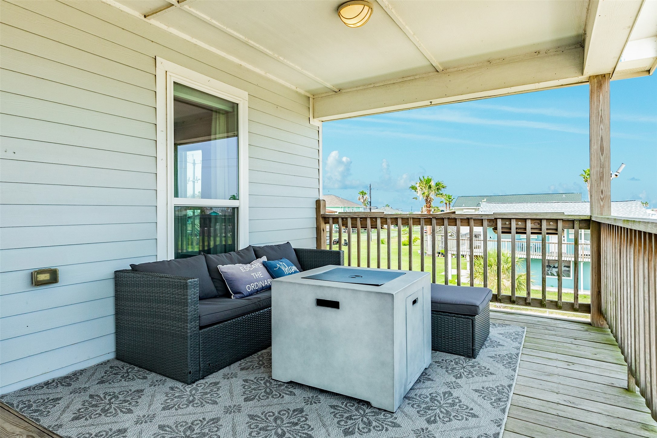 16547 Jolly Roger Road Jamaica Beach, TX 77554 - Photo 14 of 27 a roof deck with couch
