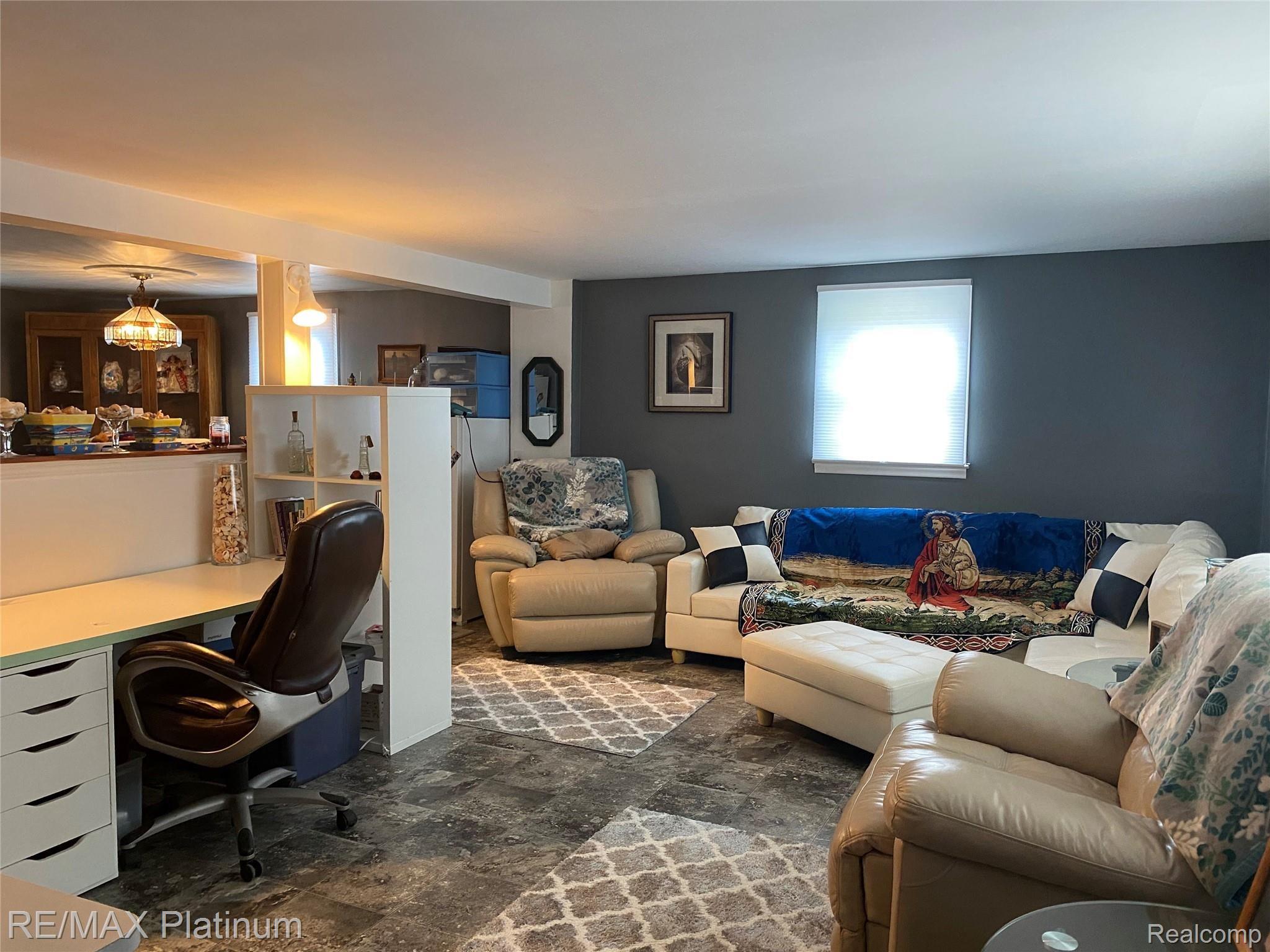 3195 East Highland Road Howell, MI 48855 - Photo 12 of 22 Lower Level Living Area