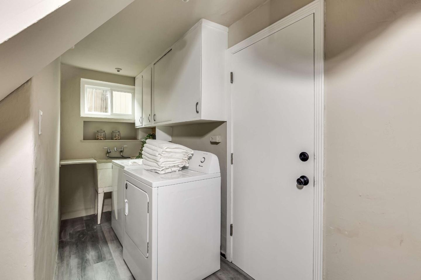 230 Victoria Road Burlingame, CA 94010 - Photo 17 of 69 a utility room with dryer and washer