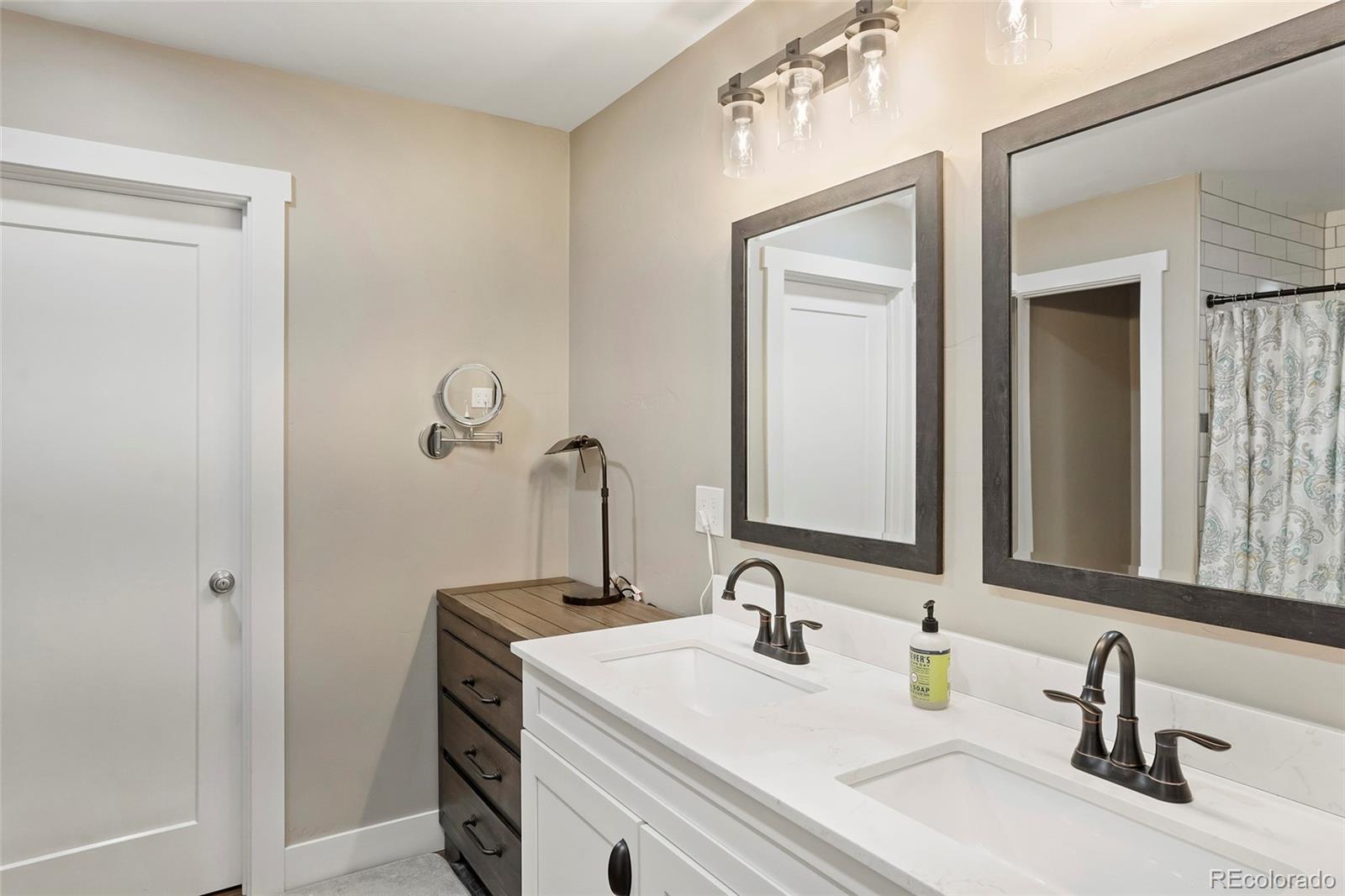 365 Lake View Road Hayden, CO 81639 - Photo 11 of 24 a bathroom with a sink and a mirror
