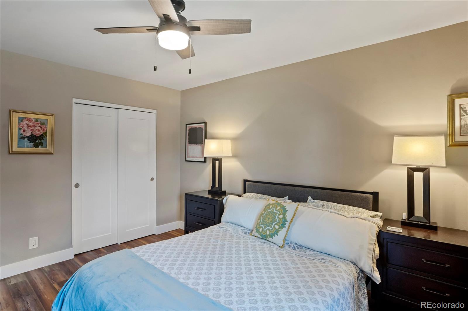 365 Lake View Road Hayden, CO 81639 - Photo 14 of 24 a bedroom with a bed and a lamp