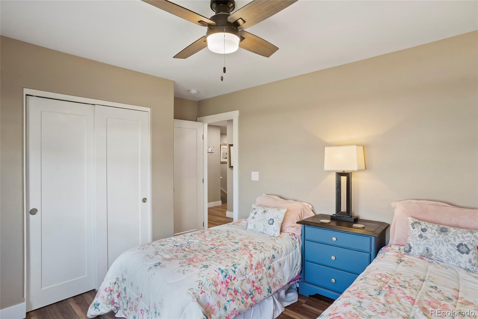 365 Lake View Road Hayden, CO 81639 - Photo 15 of 24 a bedroom with a bed and a lamp