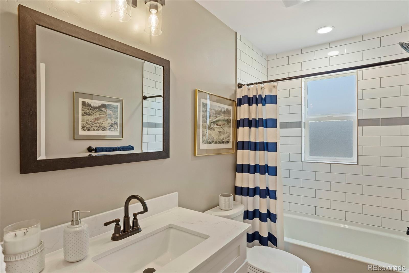365 Lake View Road Hayden, CO 81639 - Photo 16 of 24 a bathroom with a sink toilet and shower