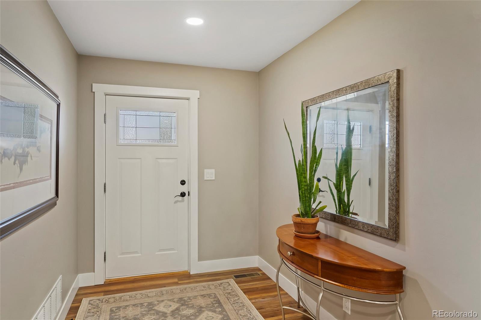 365 Lake View Road Hayden, CO 81639 - Photo 2 of 24 a front view of a house with a garden