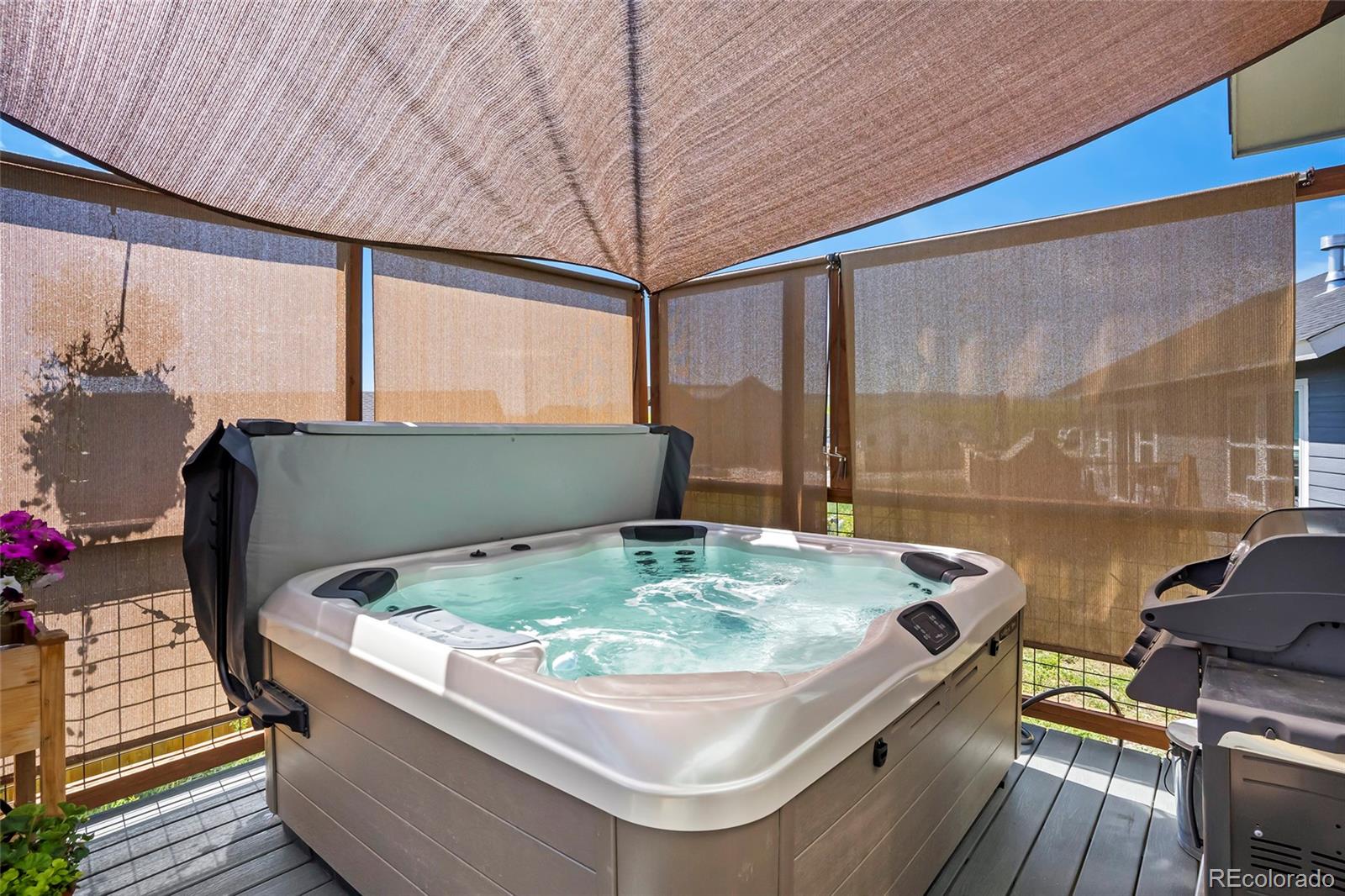 365 Lake View Road Hayden, CO 81639 - Photo 22 of 24 a wooden floor with glass top table and chairs