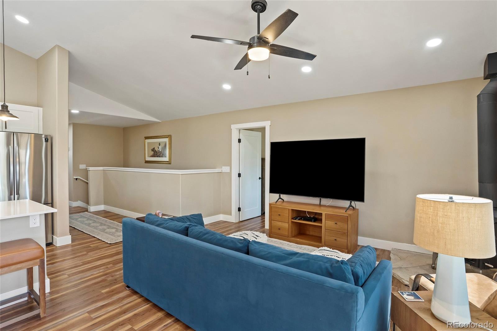 365 Lake View Road Hayden, CO 81639 - Photo 7 of 24 a living room with furniture and a flat screen tv