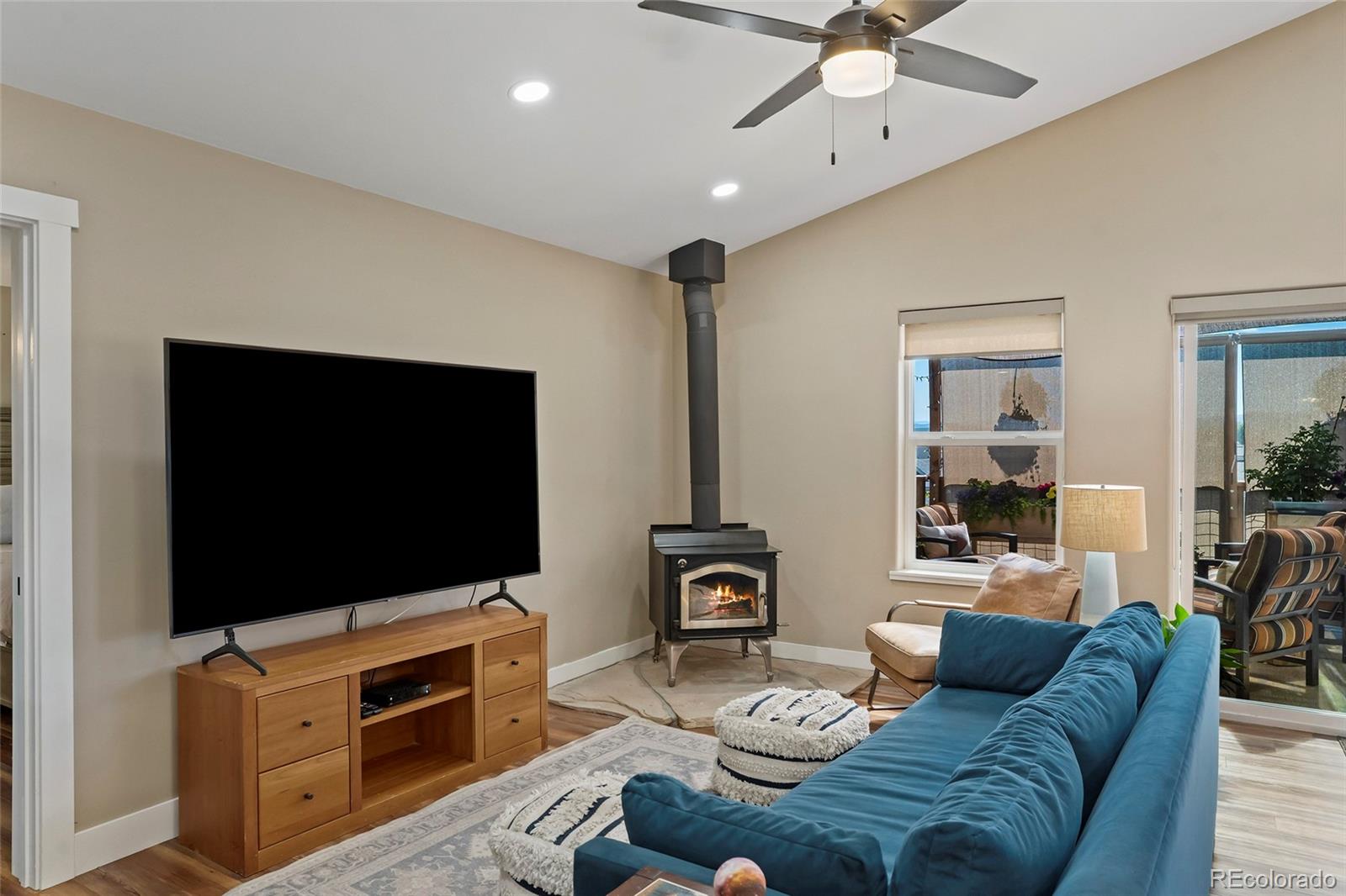 365 Lake View Road Hayden, CO 81639 - Photo 8 of 24 a living room with furniture and a flat screen tv