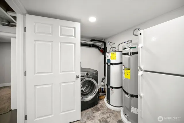 a utility room with dryer and washer