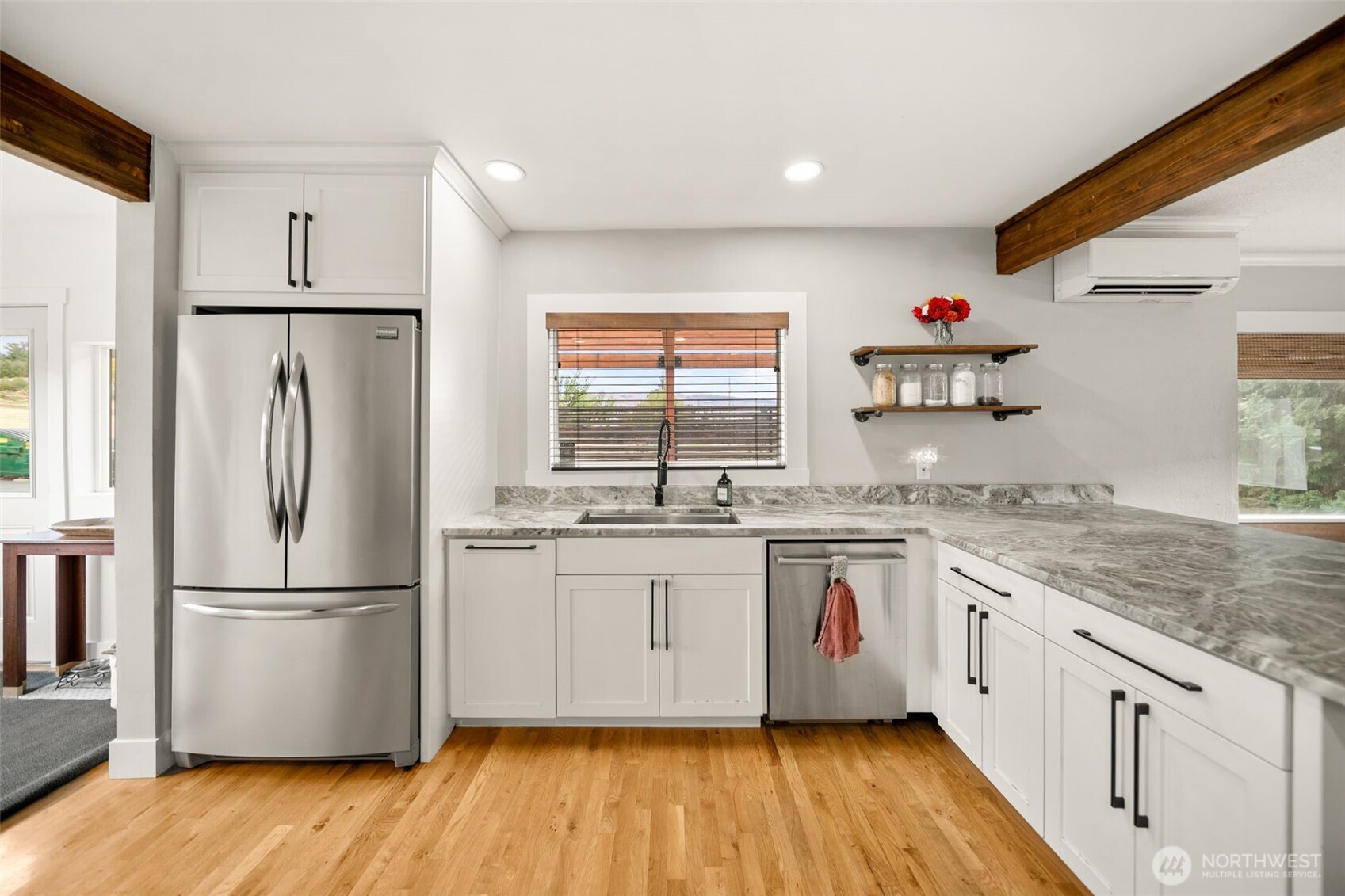 814 Easy Street Wenatchee, WA 98801 - Photo 9 of 40 a kitchen with white cabinets and white appliances