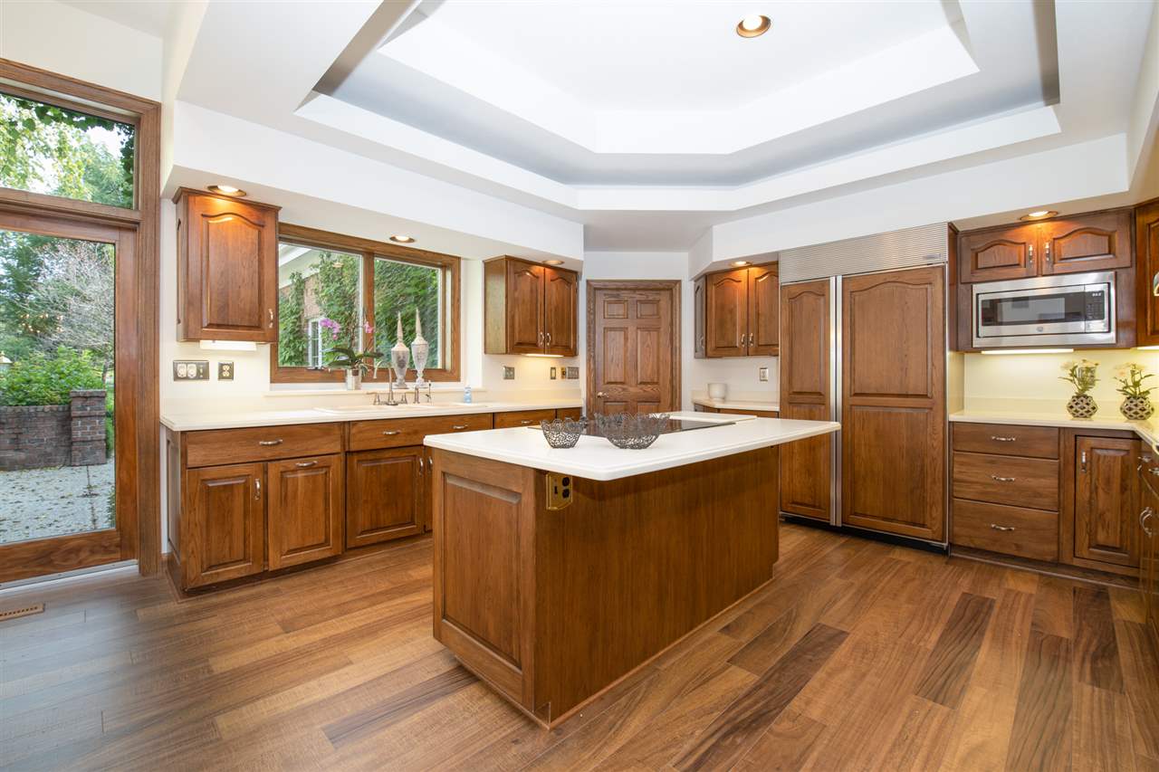 1734 Riverside Road Belvidere, IL 61008 - Photo 13 of 40 a kitchen with stainless steel appliances granite countertop a sink and a stove
