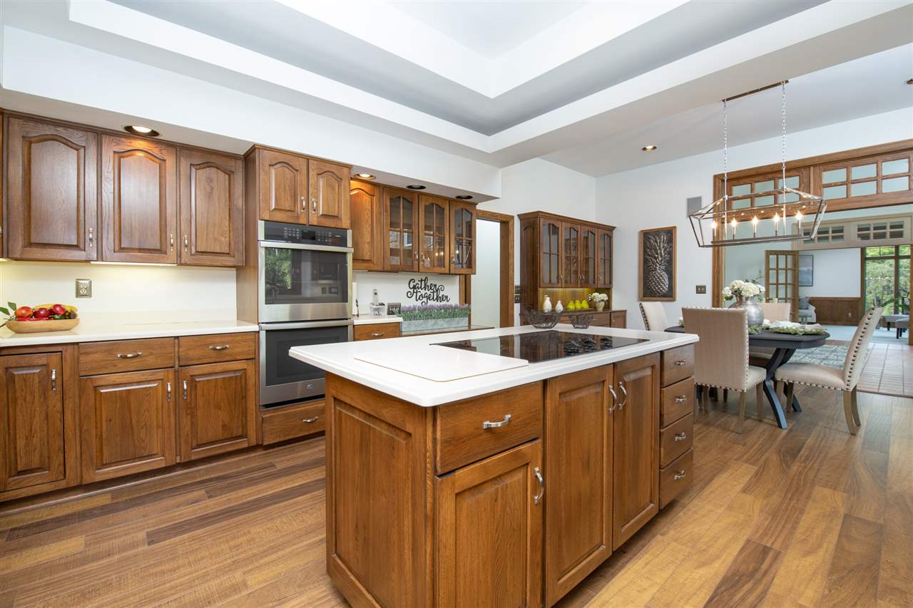 1734 Riverside Road Belvidere, IL 61008 - Photo 14 of 40 a kitchen with a sink stove and cabinets