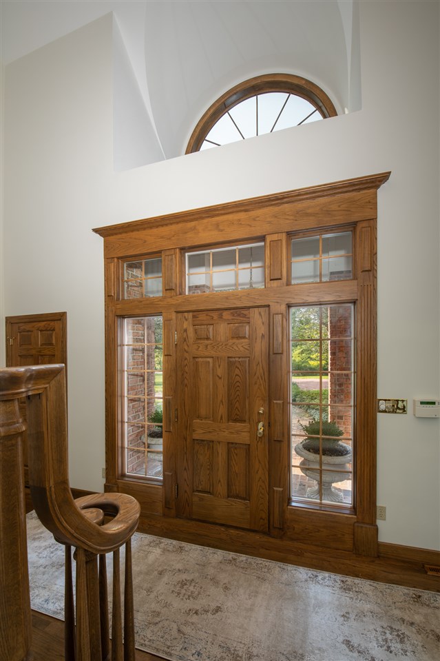 1734 Riverside Road Belvidere, IL 61008 - Photo 2 of 40 a view of a hallway with entryway door