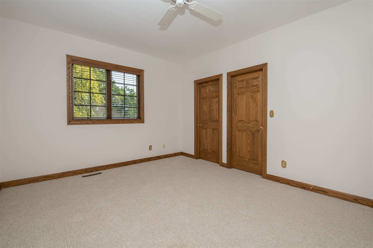 1734 Riverside Road Belvidere, IL 61008 - Photo 24 of 40 a view of an empty room with a window