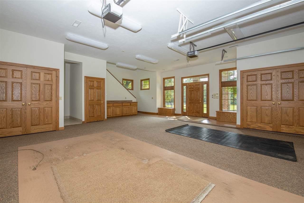 1734 Riverside Road Belvidere, IL 61008 - Photo 33 of 40 a view of a livingroom with furniture and staircase