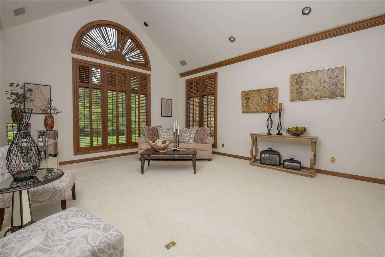 1734 Riverside Road Belvidere, IL 61008 - Photo 5 of 40 a living room with furniture and a window