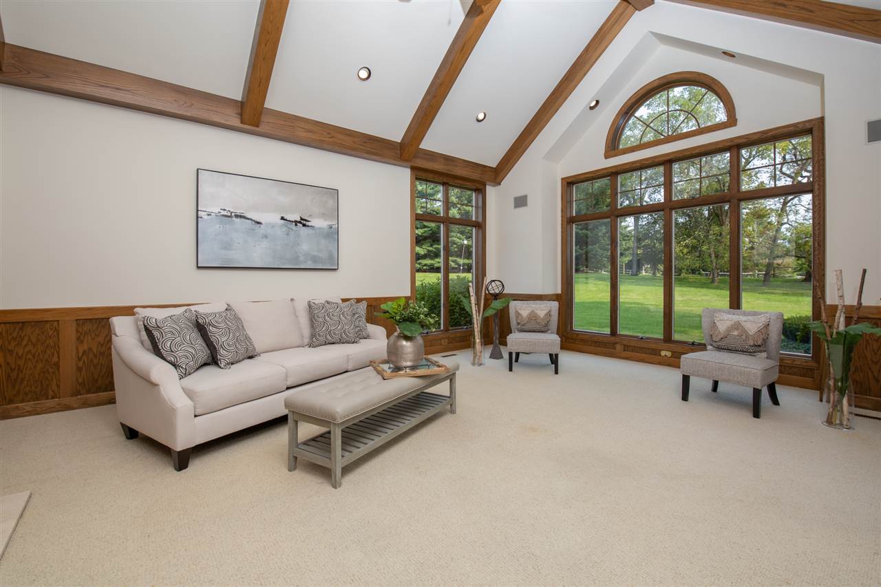 1734 Riverside Road Belvidere, IL 61008 - Photo 7 of 40 a living room with furniture and a large window