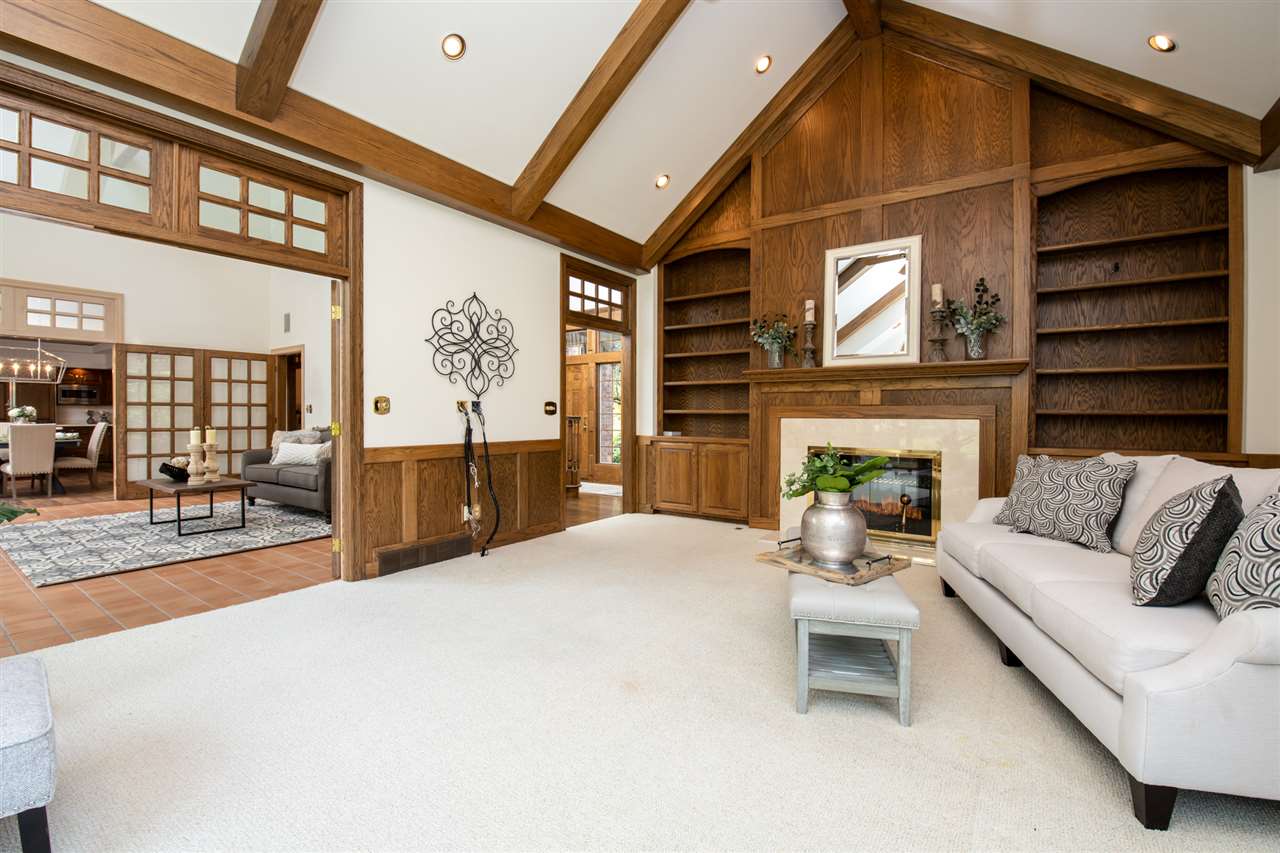 1734 Riverside Road Belvidere, IL 61008 - Photo 8 of 40 a living room with furniture and a fireplace