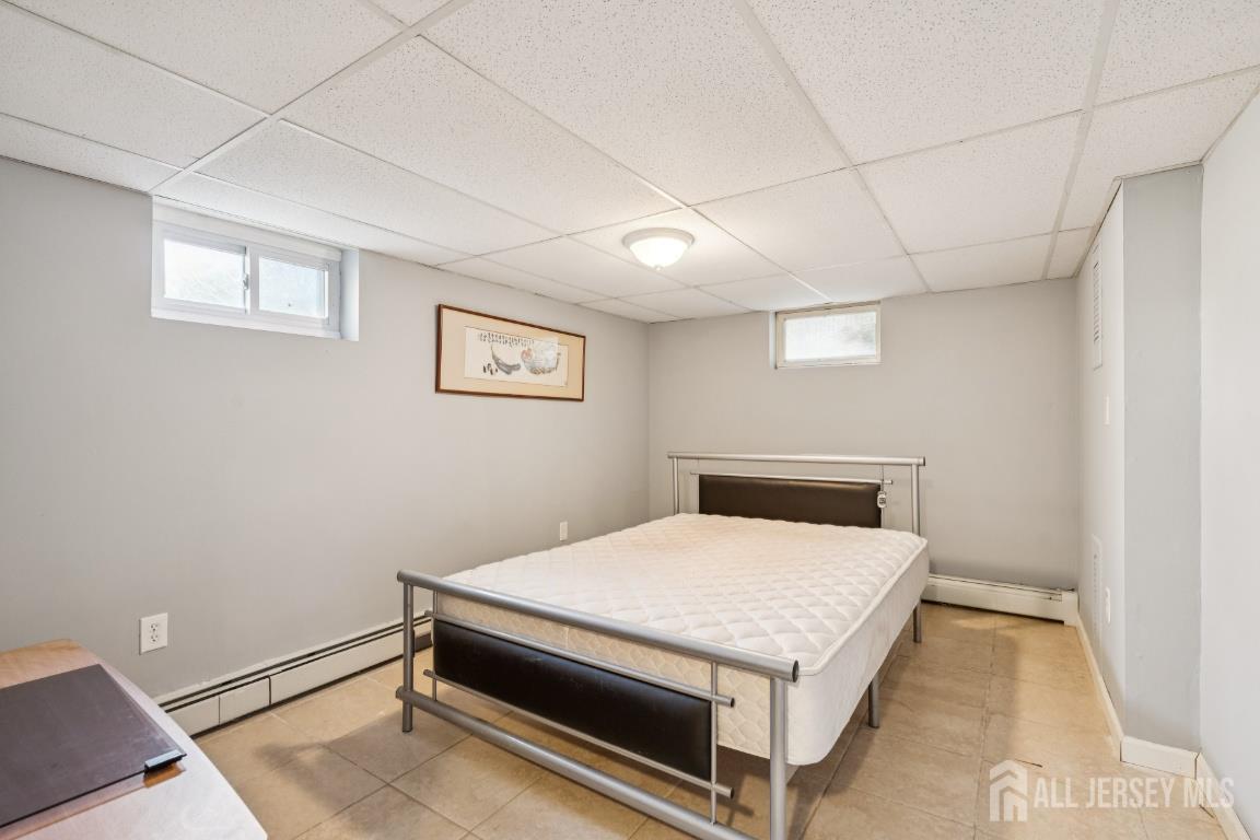 25 Reed Street Edison, NJ 08817 - Photo 19 of 23 a room with storage and utility