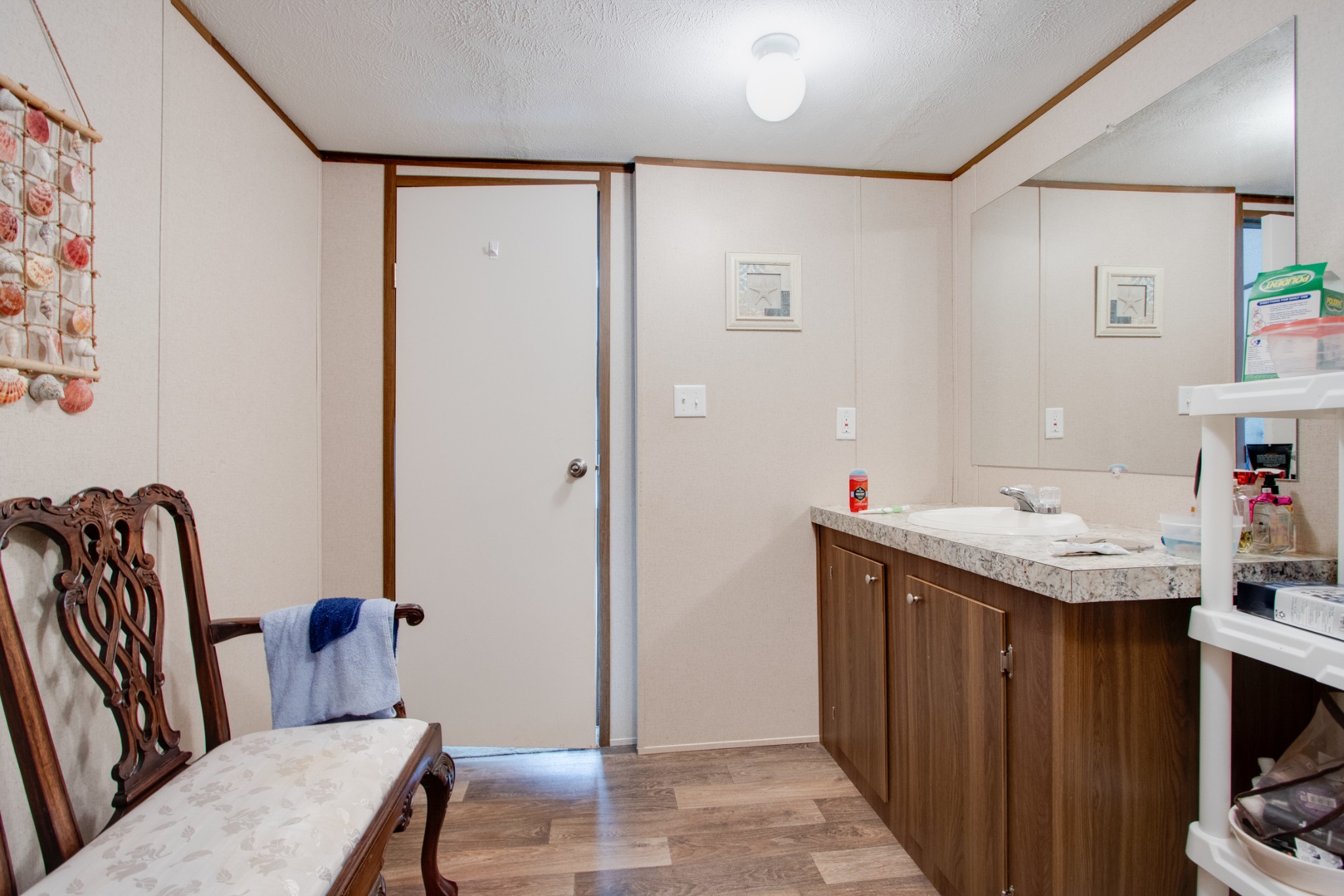 6 Spar Mine Road Lebanon, TN 37087 - Photo 22 of 30 a bathroom with a granite countertop sink a mirror and a toilet