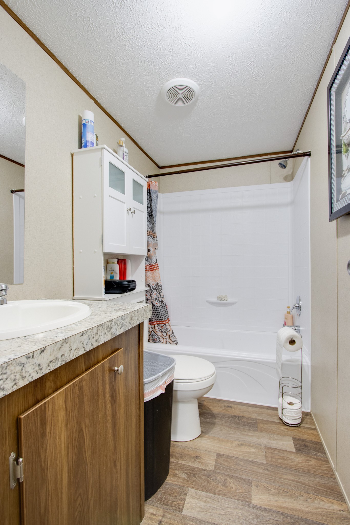 6 Spar Mine Road Lebanon, TN 37087 - Photo 25 of 30 a bathroom with a granite countertop sink toilet and shower