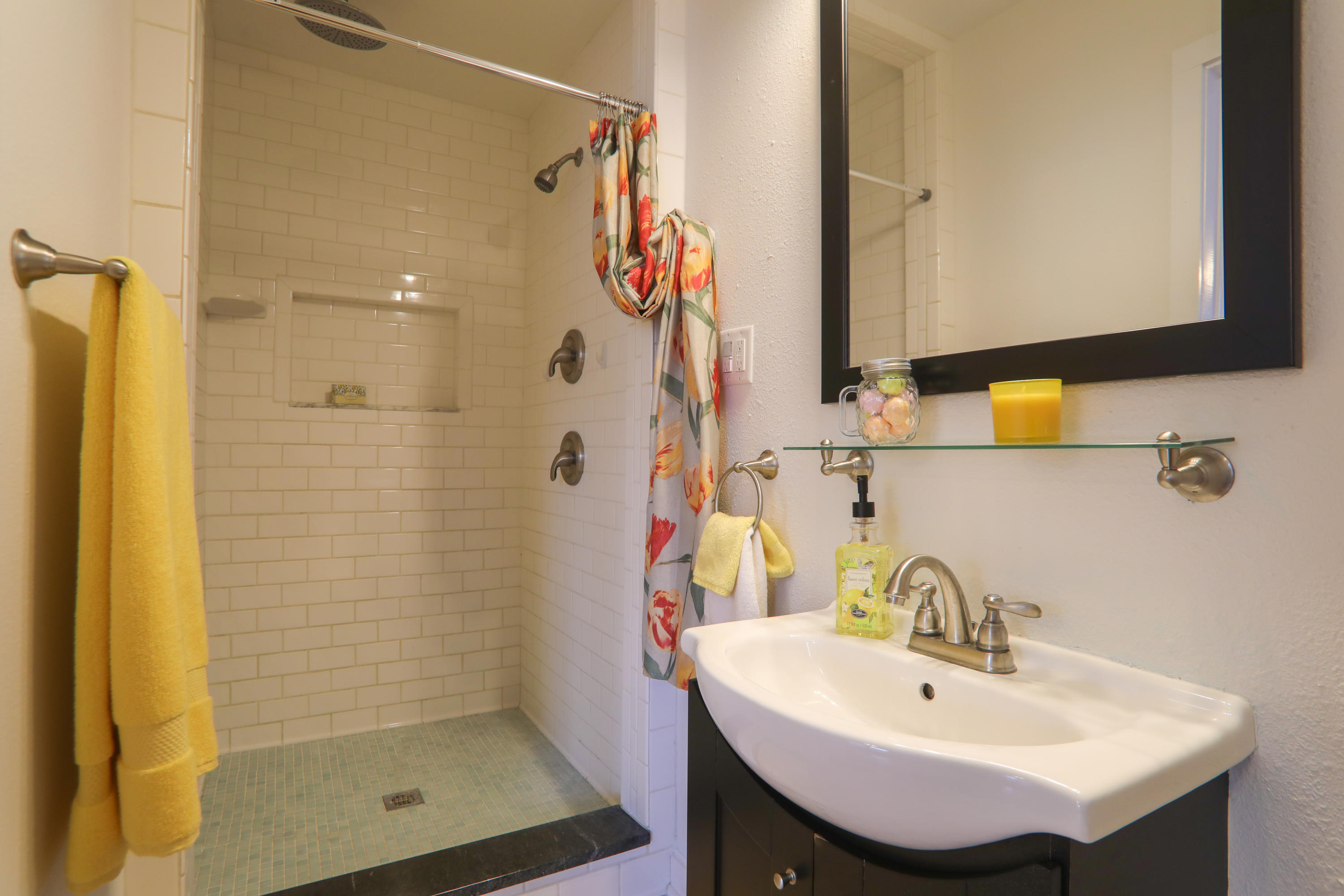 302 East 2nd Avenue Crestview, FL 32536 - Photo 9 of 12 a bathroom with a sink and a mirror