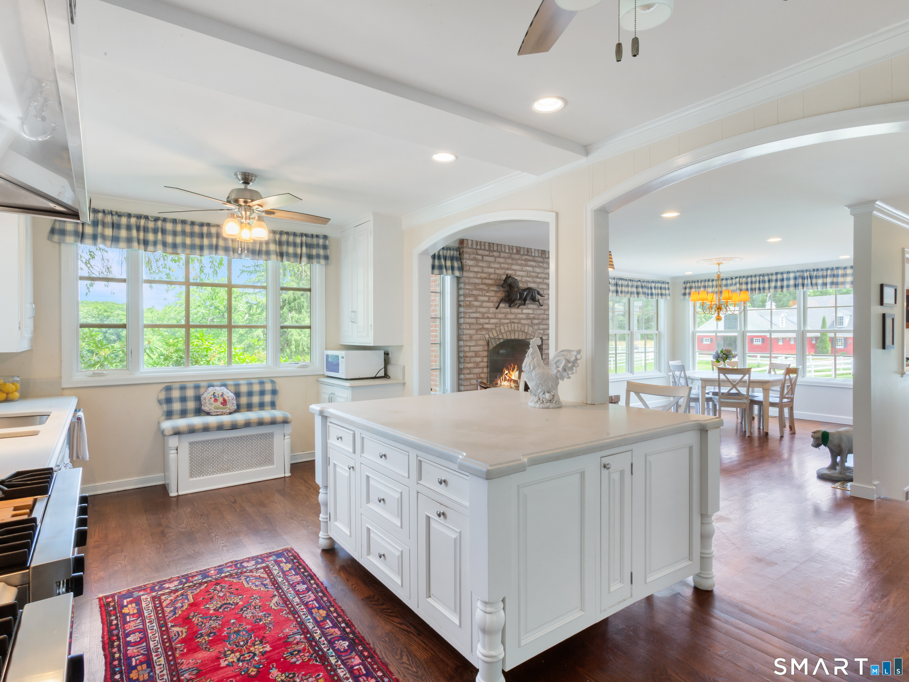 433 Wrights Crossing Road Pomfret Center, CT 06259 - Photo 15 of 40 The main kitchen has a large marble counter island, stainless steel appliances, and a Viking Professional 6-burner with griddle.