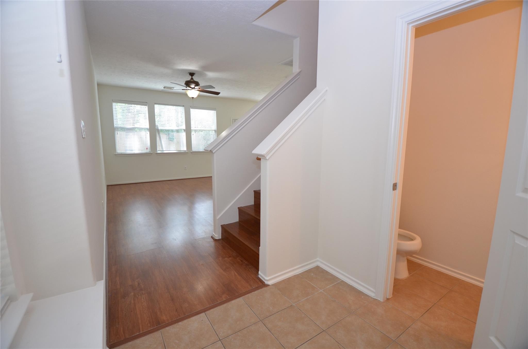 226 West Stedhill Loop Conroe, TX 77384 - Photo 3 of 10 an entryway in a hall with a window