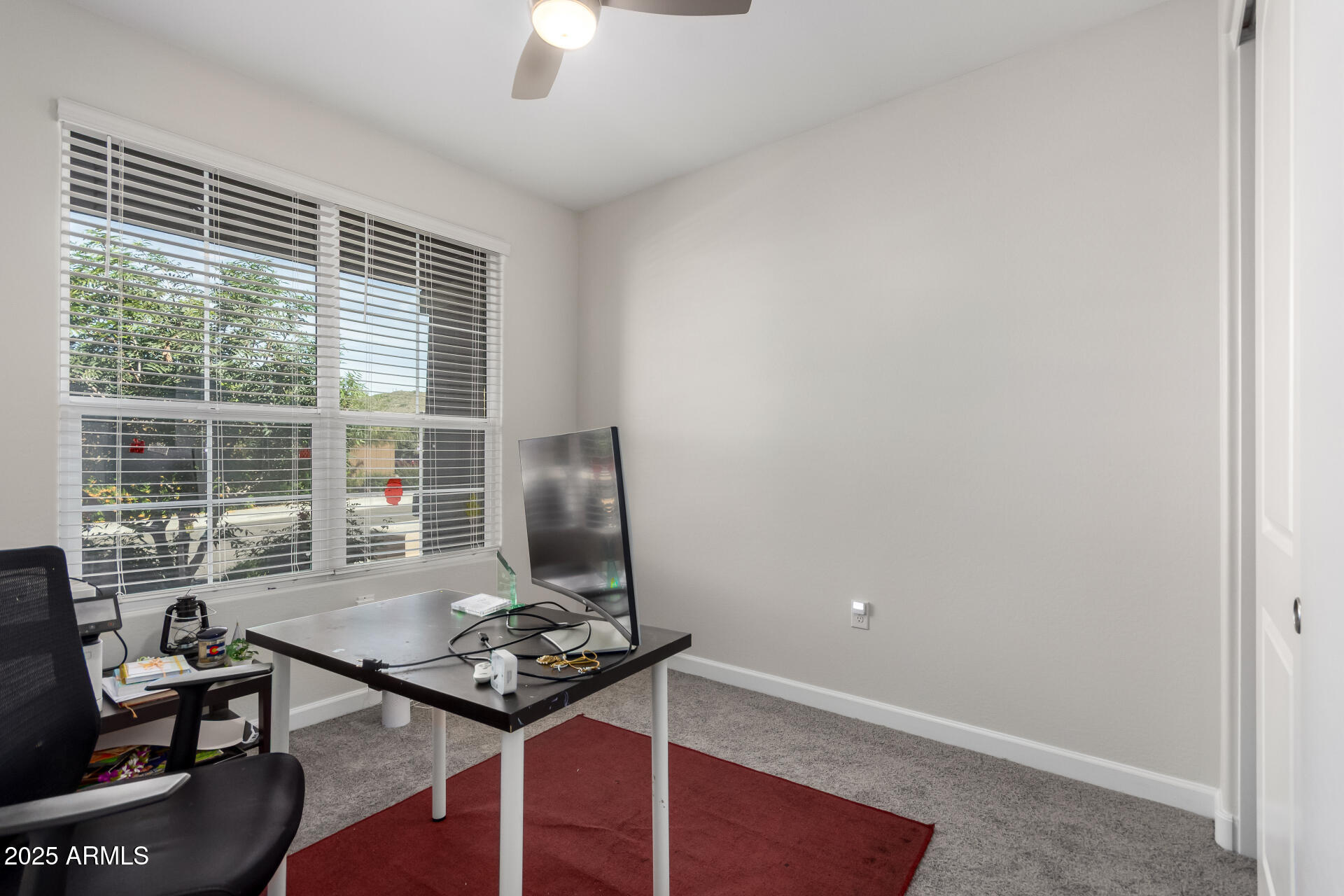 1927 West Plum Road Phoenix, AZ 85085 - Photo 11 of 17 a living room with furniture and a window