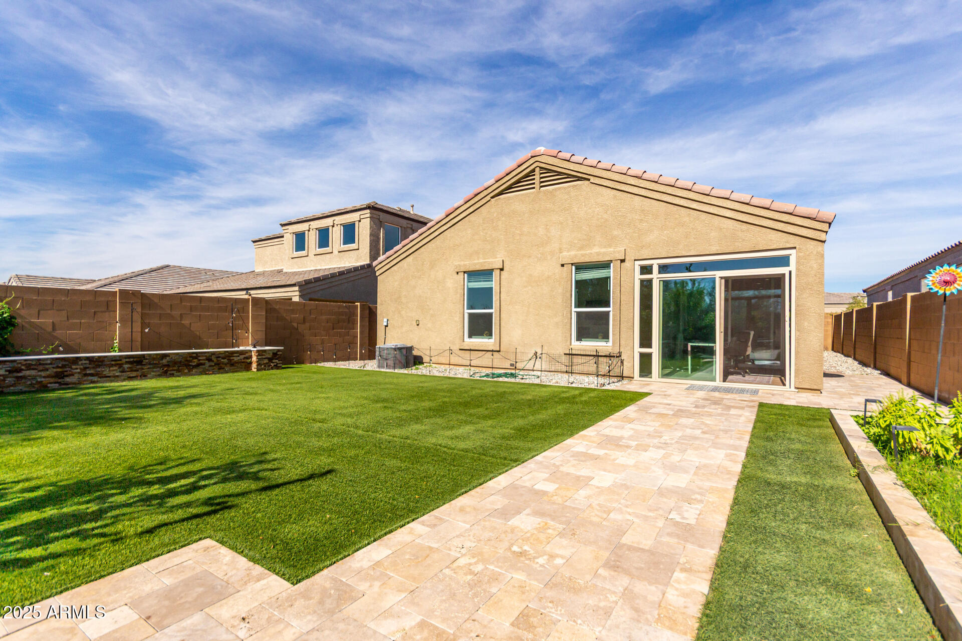 1927 West Plum Road Phoenix, AZ 85085 - Photo 15 of 17 a view of a house with a backyard