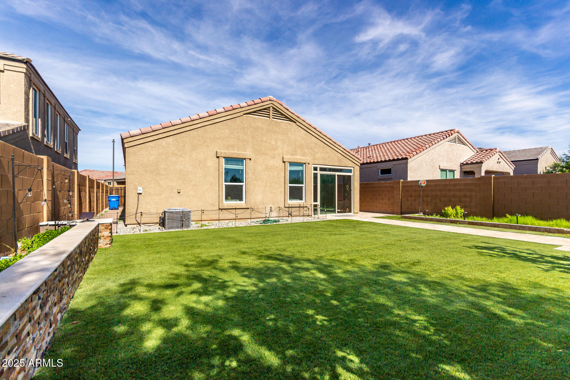 1927 West Plum Road Phoenix, AZ 85085 - Photo 16 of 17 a view of a house with a backyard