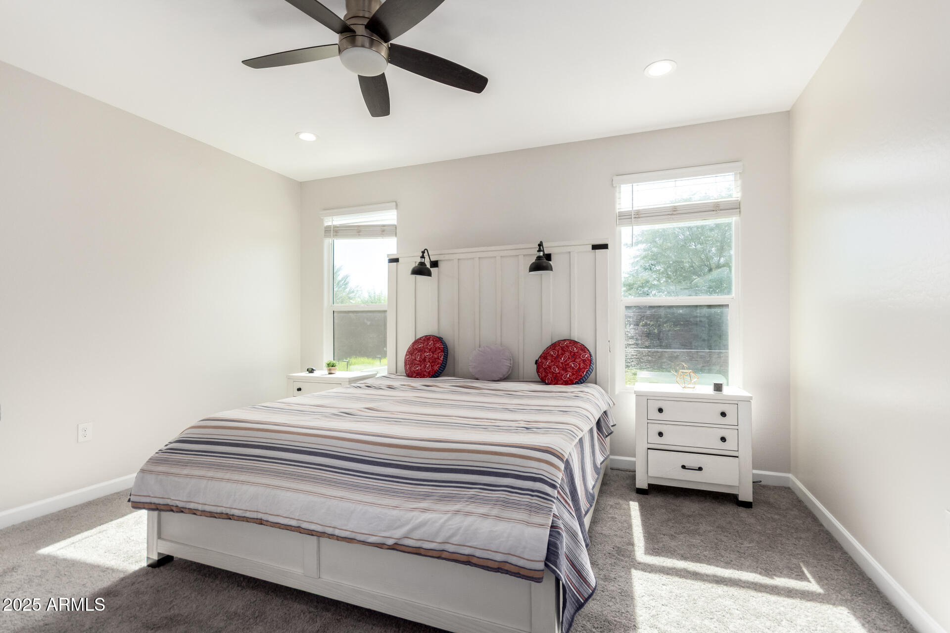 1927 West Plum Road Phoenix, AZ 85085 - Photo 6 of 17 a bedroom with a bed and a window