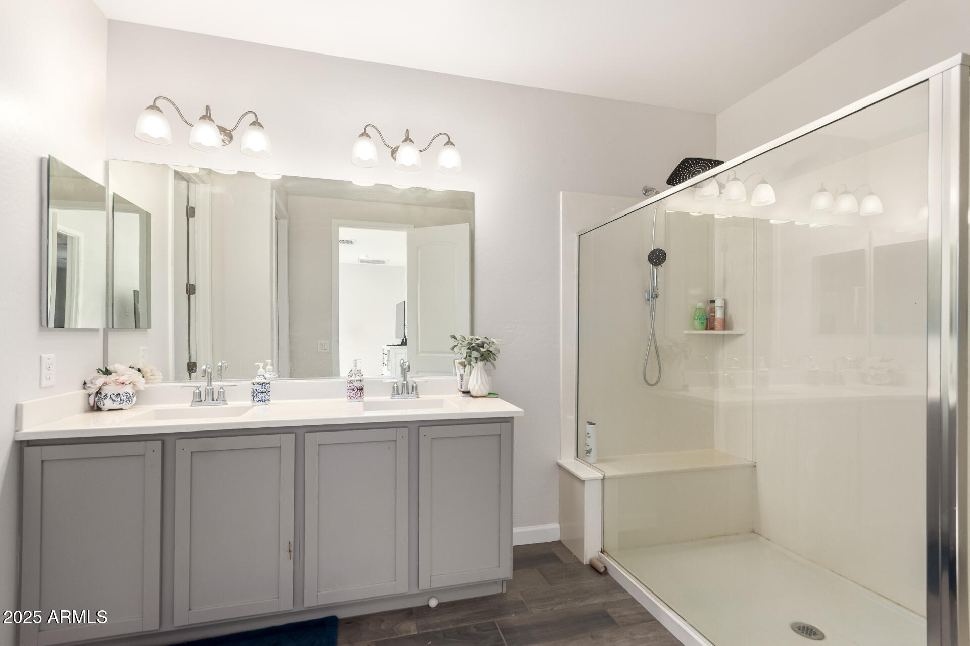 1927 West Plum Road Phoenix, AZ 85085 - Photo 7 of 17 a bathroom with a double vanity sink mirror and shower