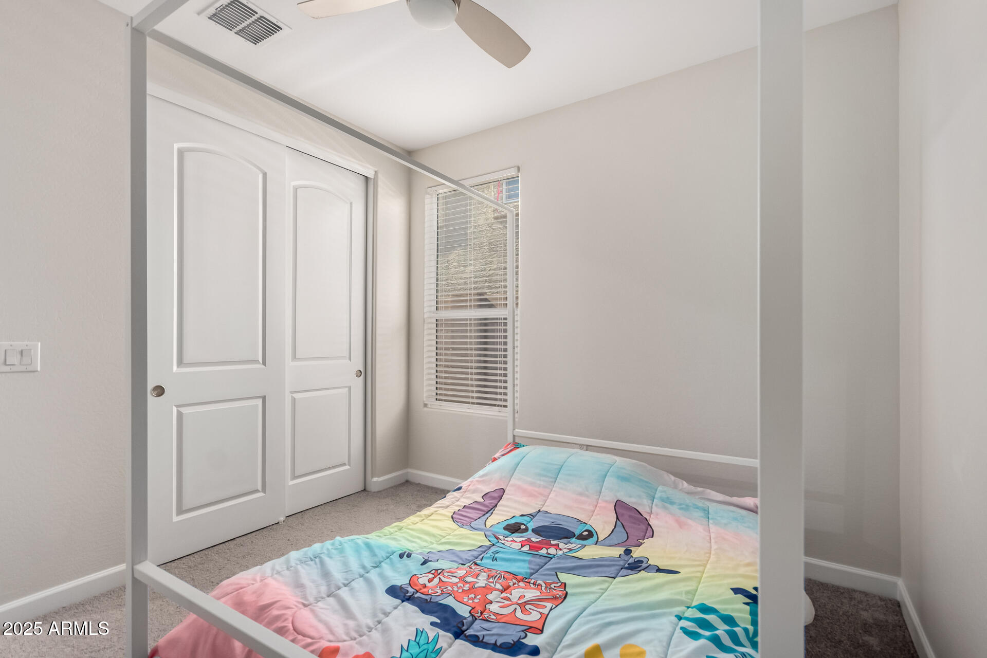 1927 West Plum Road Phoenix, AZ 85085 - Photo 9 of 17 a bedroom with a bed and a window