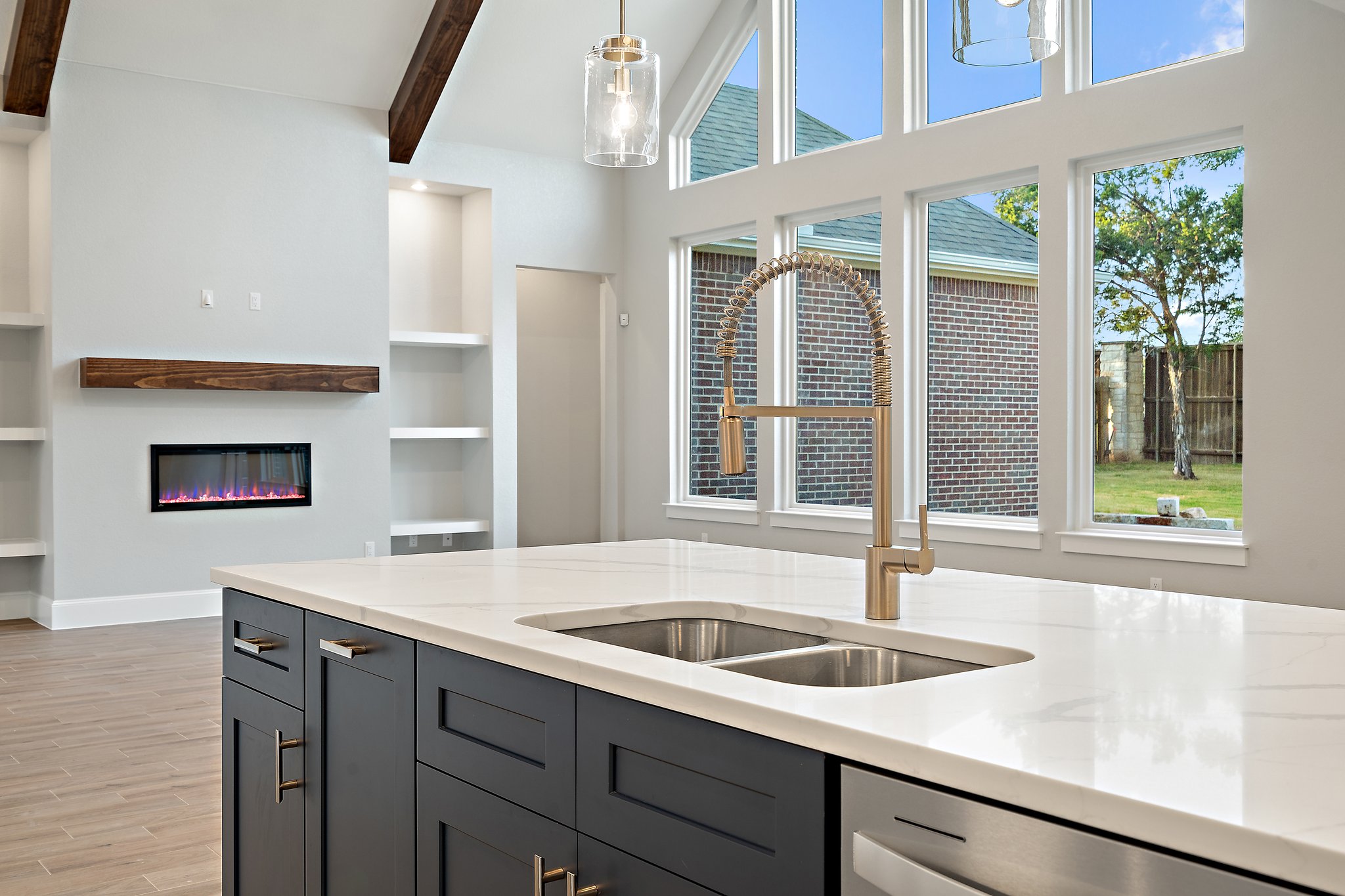 112 Axis Loop Georgetown, TX 78628 - Photo 13 of 39 a kitchen with a sink and a large window