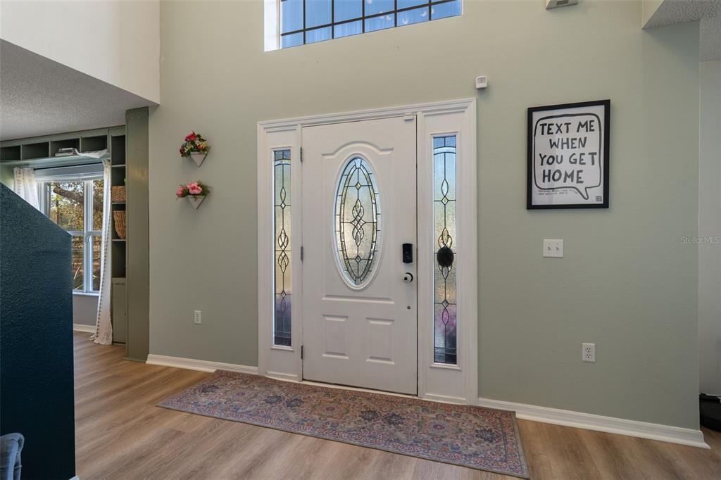 11258 Lomita Wren Road Weeki Wachee, FL 34614 - Photo 3 of 44 a view of an entryway door