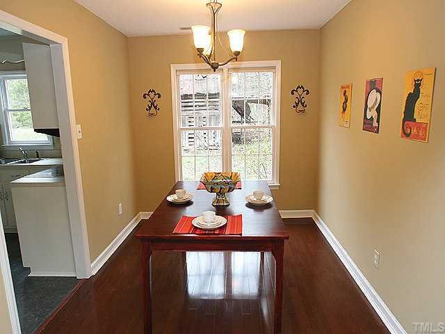 2813 Duke Homestead Road Durham, NC 27705 - Photo 3 of 6 Hardwoods floors, fresh paint and new lighting fixtures make this the perfect spot for family gatherings.