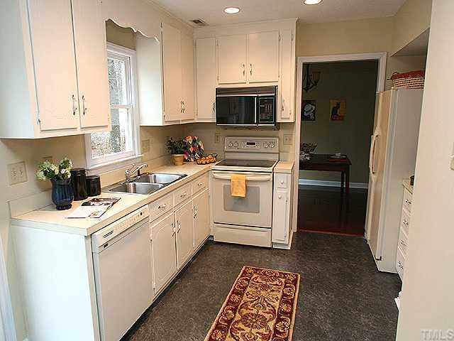 2813 Duke Homestead Road Durham, NC 27705 - Photo 4 of 6 The family cooks will enjoy this kitchen with window overlooking the backyard.