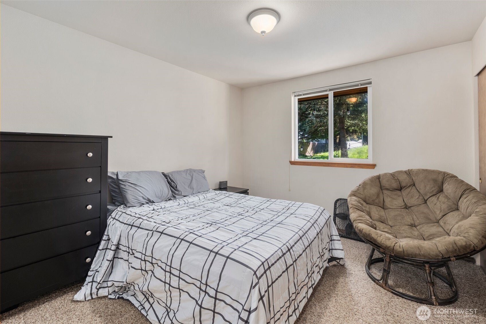 22424 South Prairie Road East Bonney Lake, WA 98391 - Photo 20 of 32 a bedroom with a bed and a window